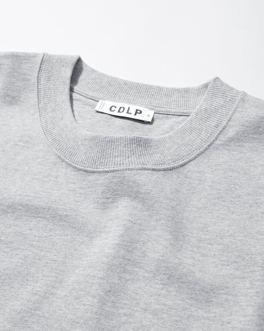 camiseta holgada de algodón para hombre en gris jaspeado compra ahora — cdlp